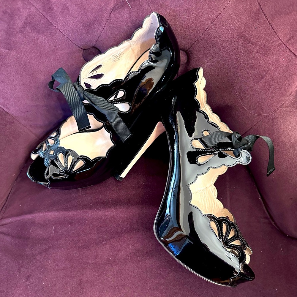 Black patent leather pumps by Joan & David